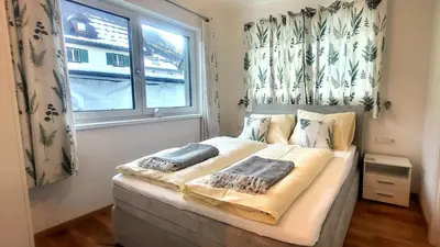 Ein Bett oder Betten in einem Zimmer der Unterkunft Lasserhäusl by Alpenidyll Apartments