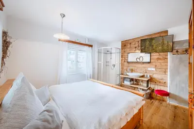 Ein Bett oder Betten in einem Zimmer der Unterkunft Ferienhaus Ennstal