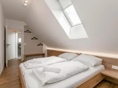 Ein Bett oder Betten in einem Zimmer der Unterkunft NRV Top 7