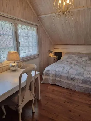 Ein Bett oder Betten in einem Zimmer der Unterkunft Countryhouse Lake Attersee - Atemberaubende Lage - Bezauberndes Hideaway