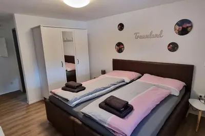 Ein Bett oder Betten in einem Zimmer der Unterkunft Bergzeit