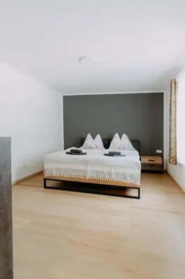 Ein Bett oder Betten in einem Zimmer der Unterkunft Kupferdachl