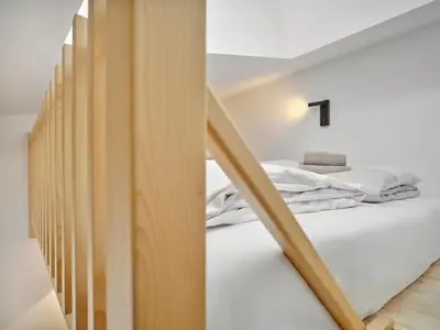 Ein Bett oder Betten in einem Zimmer der Unterkunft The Mountain Hideaway 211 by AA Holiday Homes SKI IN SKI Out Die Tauplitz
