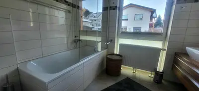 Ein Badezimmer in der Unterkunft Dachsteinblick by Alpendyll Apartments