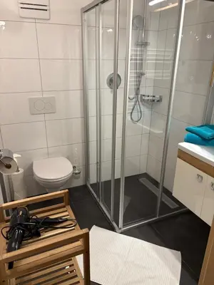Ein Badezimmer in der Unterkunft Haus Alpenheim