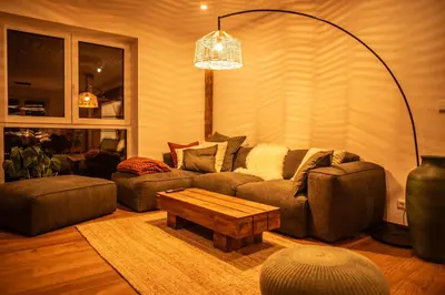 Ein Sitzbereich in der Unterkunft Edelweiss Lodge