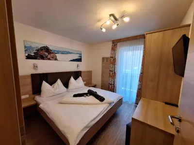 Ein Bett oder Betten in einem Zimmer der Unterkunft Die Schladmingerin Franz
