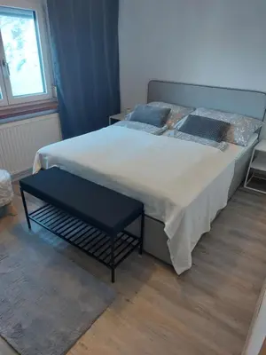 Ein Bett oder Betten in einem Zimmer der Unterkunft Ferienhaus Frankenmarkt