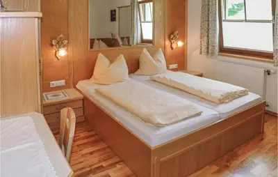 Ein Bett oder Betten in einem Zimmer der Unterkunft Sehr Schoene Ferienwohnung