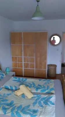 Ein Bett oder Betten in einem Zimmer der Unterkunft Rooming Green Weyregg