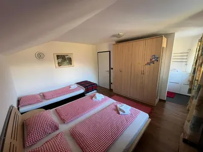 Ein Bett oder Betten in einem Zimmer der Unterkunft Ferienwohnung am Stambach