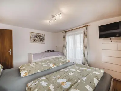 Ein Bett oder Betten in einem Zimmer der Unterkunft Apartment Dachstein Südwand-2 by Interhome