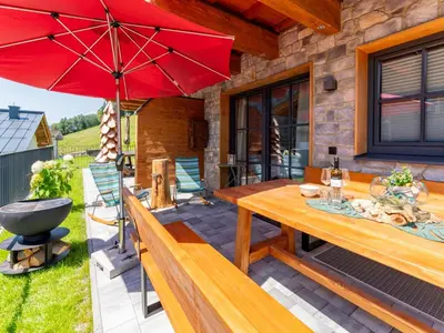 Ein Balkon oder eine Terrasse in der Unterkunft Wagrainer TauernLodge 42D