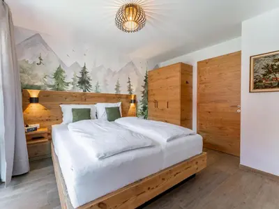 Ein Bett oder Betten in einem Zimmer der Unterkunft Wagrainer TauernLodge 42D
