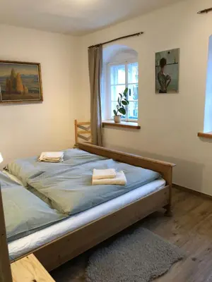 Ein Bett oder Betten in einem Zimmer der Unterkunft Am Neupersteg - Eine Wohnung zum Wohlfühlen