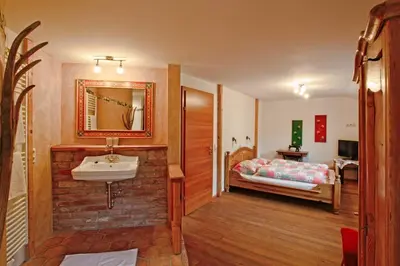 Ein Bett oder Betten in einem Zimmer der Unterkunft Ortnerhof Ennstal