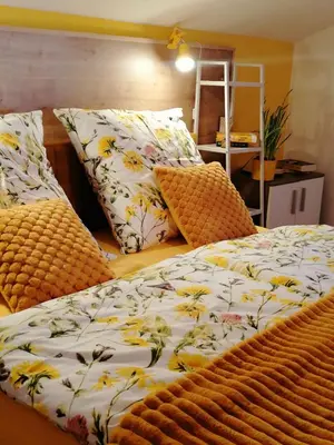 Ein Bett oder Betten in einem Zimmer der Unterkunft Alpenblumal
