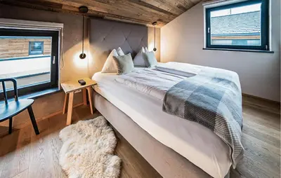 Ein Bett oder Betten in einem Zimmer der Unterkunft Ferienhaus Mit Sauna Katschb