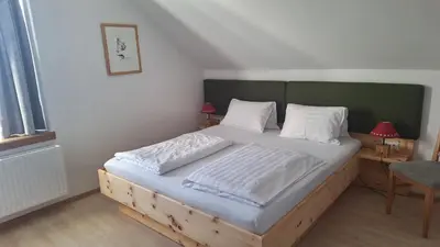 Ein Bett oder Betten in einem Zimmer der Unterkunft Haus König