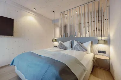 Ein Bett oder Betten in einem Zimmer der Unterkunft Mariengut - Natur Aparthotel Kramer