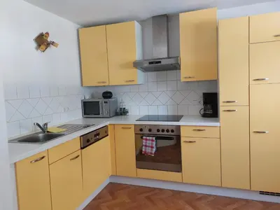 Küche/Küchenzeile in der Unterkunft Grimmingapartment Maier