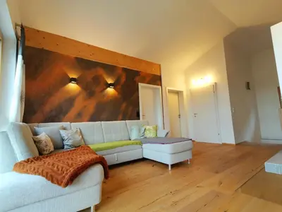 Ein Sitzbereich in der Unterkunft Chalet Leo