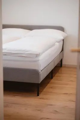 Ein Bett oder Betten in einem Zimmer der Unterkunft Kalkalpen Apartments