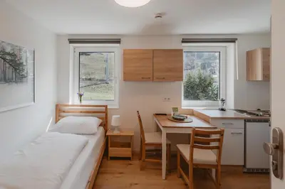 Ein Bett oder Betten in einem Zimmer der Unterkunft Kalkalpen Apartments