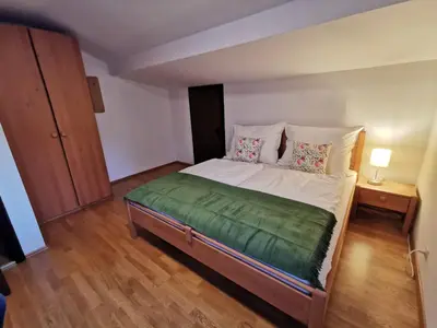 Ein Bett oder Betten in einem Zimmer der Unterkunft Haus Comodo