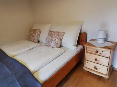 Ein Bett oder Betten in einem Zimmer der Unterkunft Haus Comodo