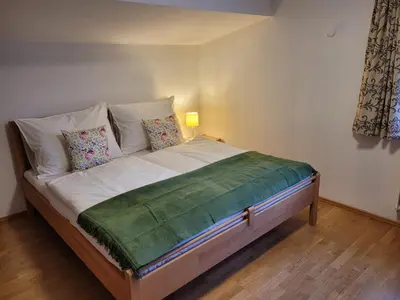 Ein Bett oder Betten in einem Zimmer der Unterkunft Haus Comodo