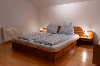 Ein Bett oder Betten in einem Zimmer der Unterkunft Tanjas gemütliches Haus am Mondsee