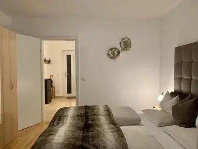 Ein Bett oder Betten in einem Zimmer der Unterkunft Almlodge Flachau