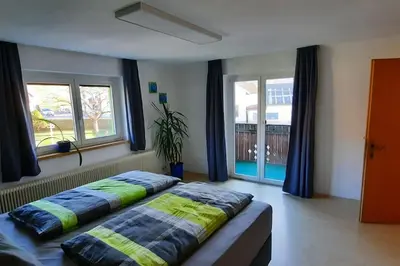 Ein Bett oder Betten in einem Zimmer der Unterkunft Ferienwohnung in Weyregg am Attersee
