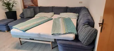 Ein Bett oder Betten in einem Zimmer der Unterkunft Ferienwohnung in Weyregg am Attersee