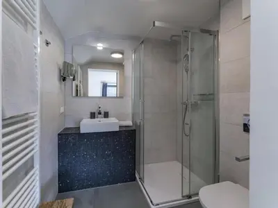 Ein Badezimmer in der Unterkunft Mozart Lodge