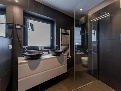 Ein Badezimmer in der Unterkunft Mozart Lodge