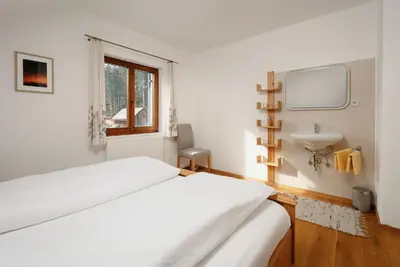Ein Bett oder Betten in einem Zimmer der Unterkunft Haus Grundlsee