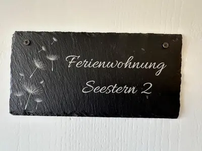 Ein Zertifikat, Auszeichnung, Logo oder anderes Dokument, das in der Unterkunft Ferienwohnung Seestern-Mondsee ausgestellt ist