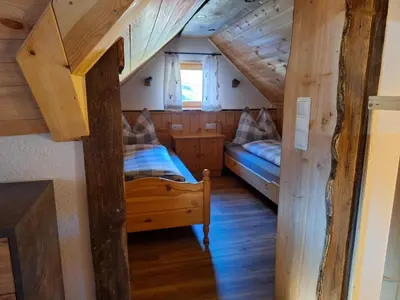 Ein Bett oder Betten in einem Zimmer der Unterkunft Leitnerbauer's Troadkasten