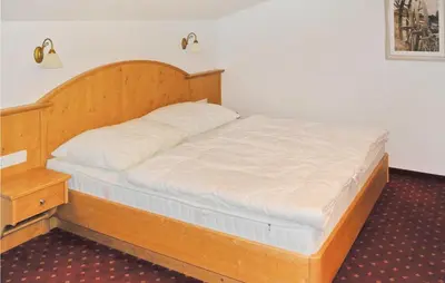 Ein Bett oder Betten in einem Zimmer der Unterkunft Gemuetliche Ferienwohnung