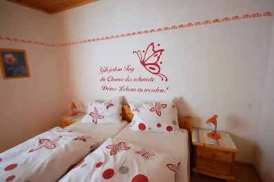 Ein Bett oder Betten in einem Zimmer der Unterkunft Ferienhaus Tschernitz