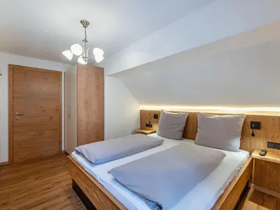 Ein Bett oder Betten in einem Zimmer der Unterkunft Apartment Karlspitz by Interhome