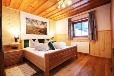 Ein Bett oder Betten in einem Zimmer der Unterkunft Almliesl ALTZ-718