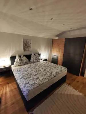 Ein Bett oder Betten in einem Zimmer der Unterkunft Alex´s Ferienwohnung