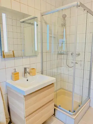 Ein Badezimmer in der Unterkunft Zentrale Wohnung mit Alpenblick