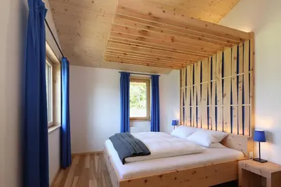 Ein Bett oder Betten in einem Zimmer der Unterkunft Chalet Alm Planai