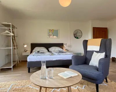Ein Bett oder Betten in einem Zimmer der Unterkunft Bäckerhaus - Wohnung mit Pool und Garten