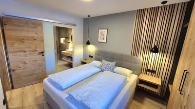 Ein Bett oder Betten in einem Zimmer der Unterkunft Apartment Sunplatzl