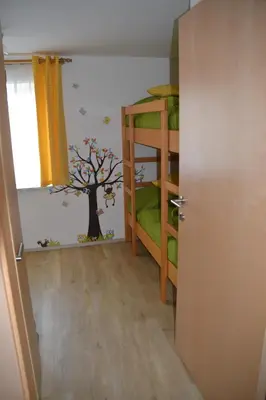 Ein Bett oder Betten in einem Zimmer der Unterkunft Ferienwohnung Nagelschmied